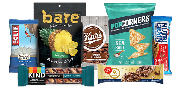 Variety of healthy snack bars and crunchy snacks in colorful packaging.