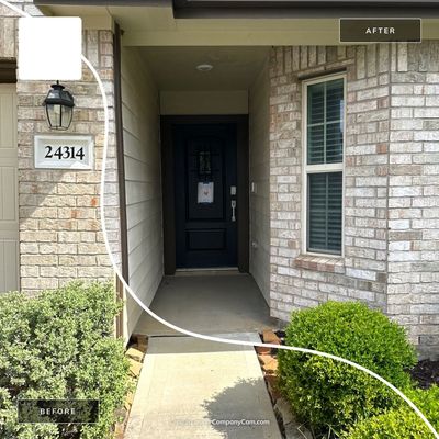 A before and after image of a home after it has been pressure washed, 