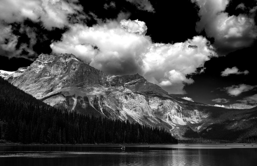 High contrast black and white landscape photo of Emerald Lake and Canada's Rocky Mountains. 