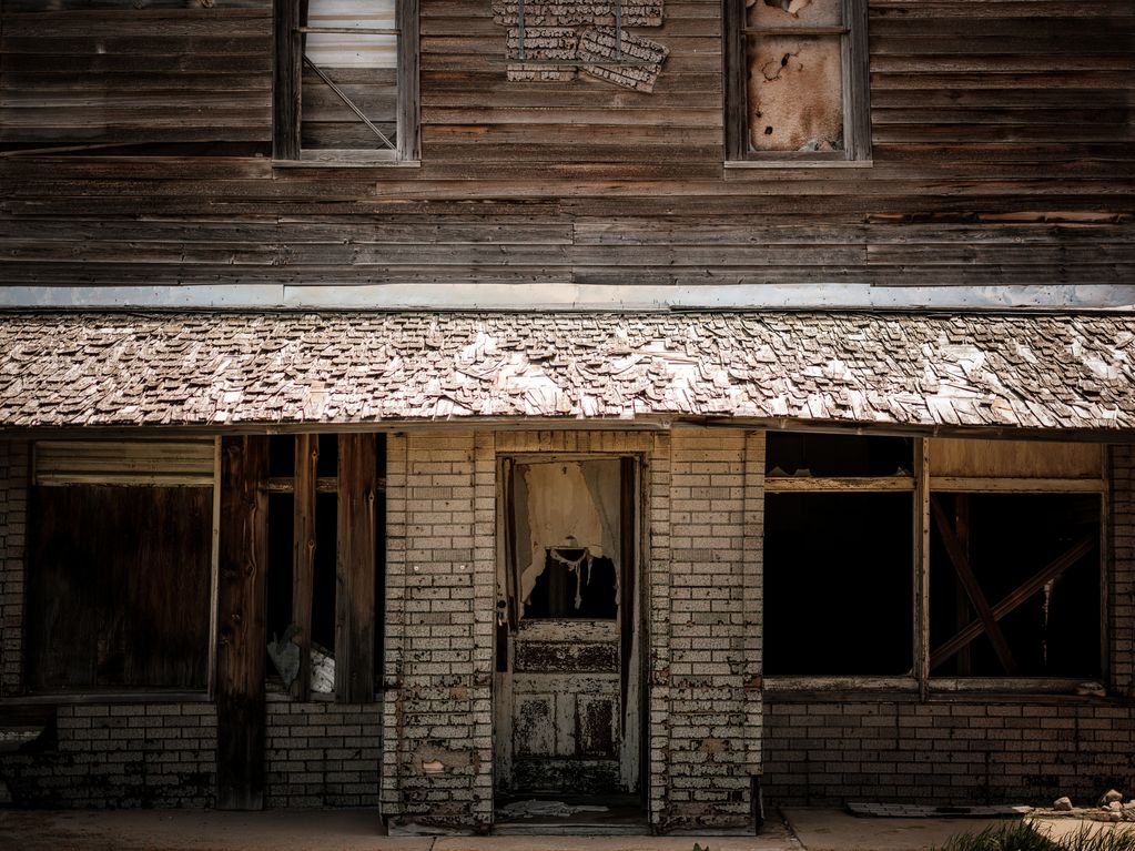 The front of an abandoned building in Moccasin, Montana, USA. 