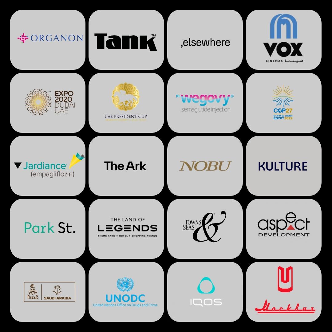 Grid of diverse corporate and event logos on gray tiles.