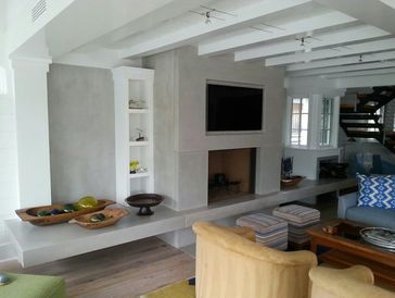 Full wall paneled fireplace surround