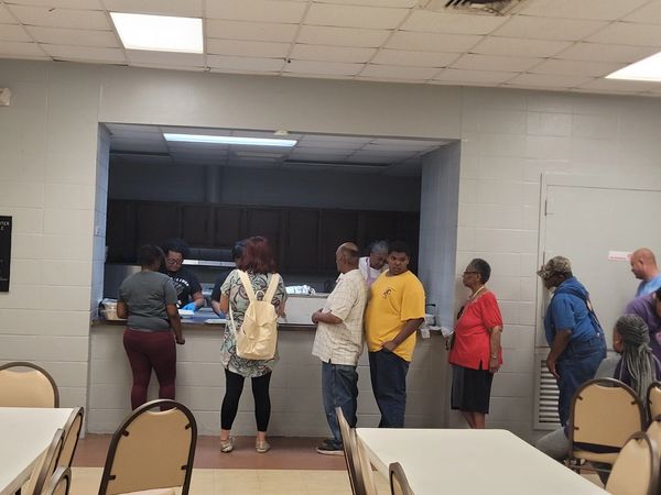 Christian United Alliance 501c3 
Vounteers serving free hot meals.