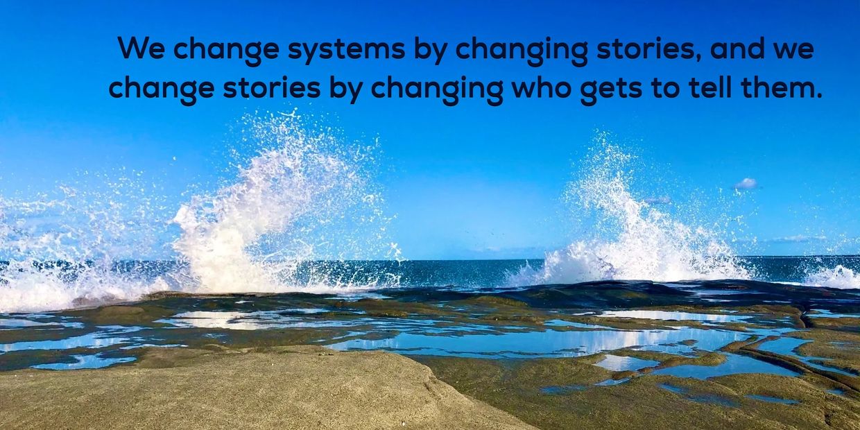 ocean background waves crashing on rocks text over to top: 