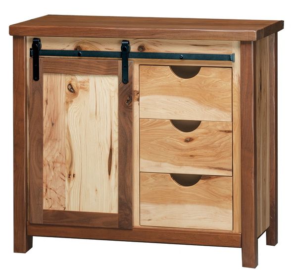 Rustic wooden cabinet with sliding barn door and three drawers.