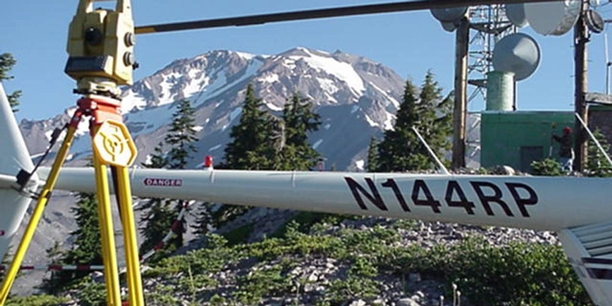 Cadastral survey monument installation in Northeast Washington by land surveying team