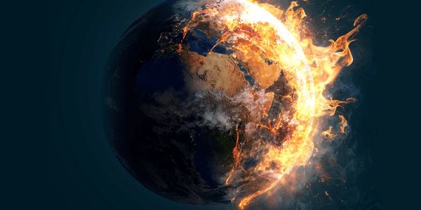 Earth engulfed in fiery flames symbolizing intense heat or destruction.
