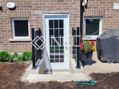 External view of the completed Vernon basement separate entrance in Oakville  Ontario.