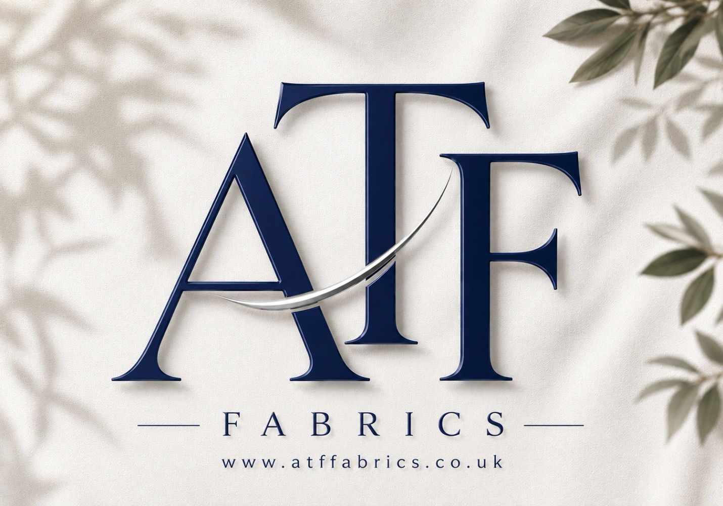 Elegant logo of ATF Fabrics with nature shadows.
