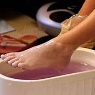 Paraffin wax treatment for feet & hands.  The wax helps to moisturise and soften the skin, Very bene