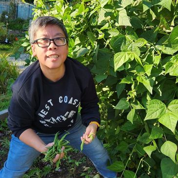 A photo of Joyce Yang Registered Clinical Hypnotherapist in the garden