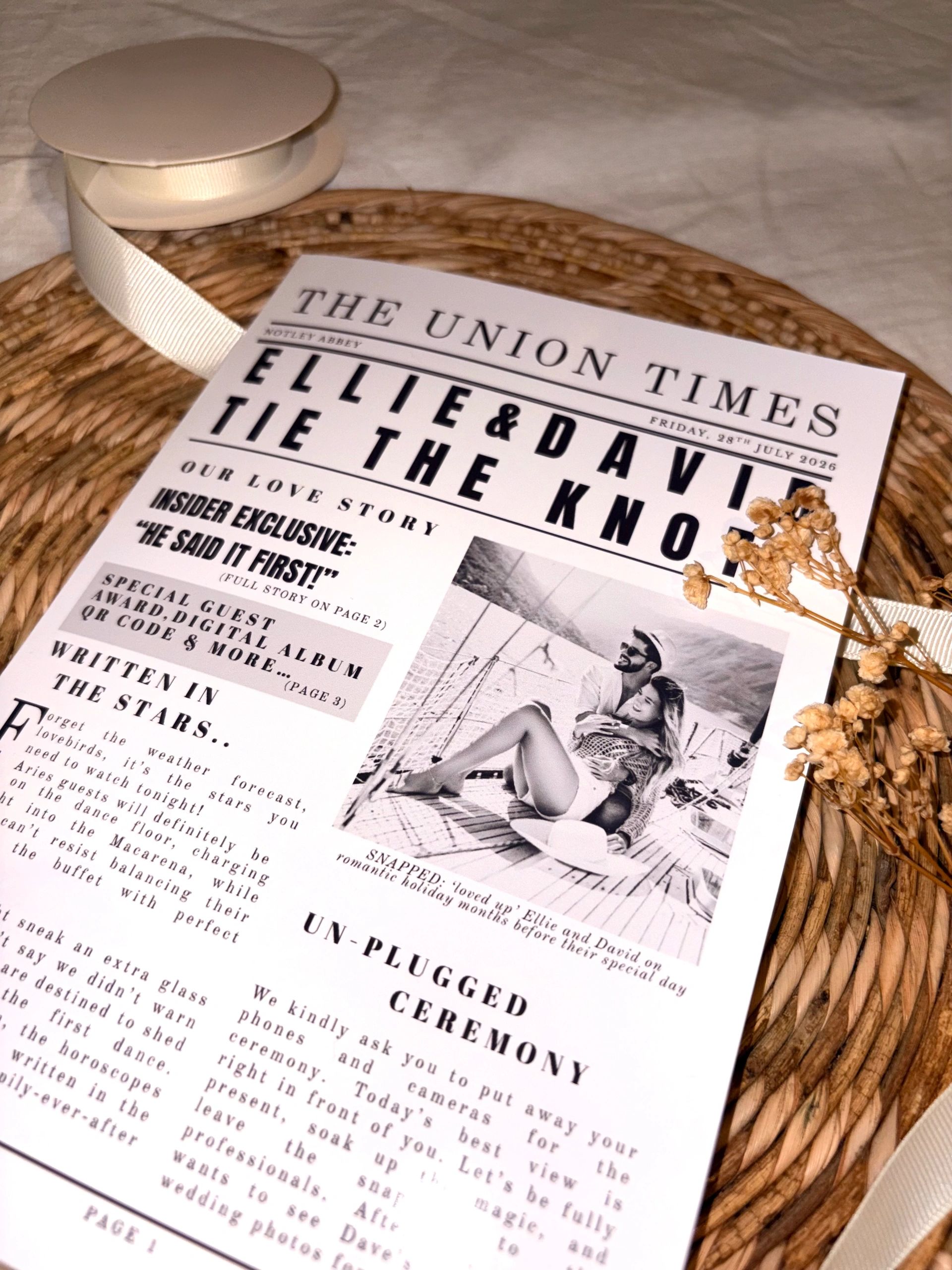 Wedding-themed newspaper styled invitation for Ellie and David's unplugged ceremony.
