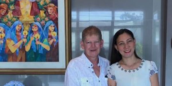 Marlin and Ana, owners of Marlin's Mowing Services LLC.