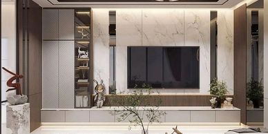 Modern living room with a sleek TV unit and decorative accents.