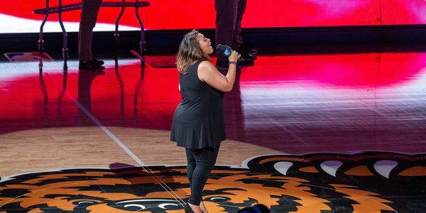 Candy Fox singing the National Anthem at the NBA Grizzlies Game.
Photo credit: Frank Chin