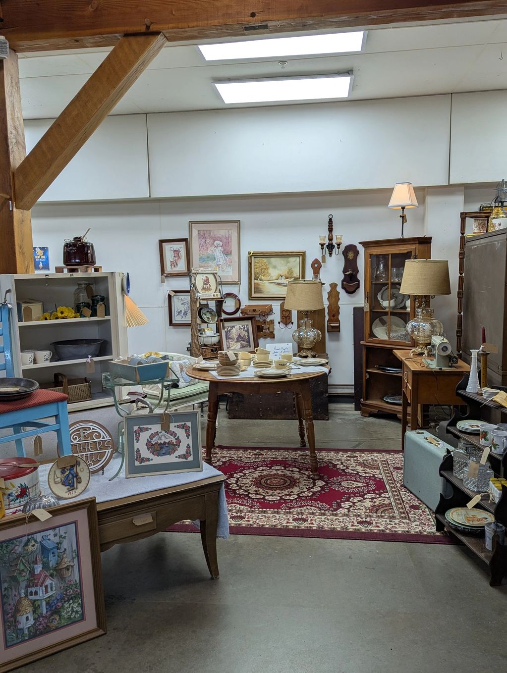 Vintage wall art, furniture, decorative lamps, and charming vintage kitchen items and decor