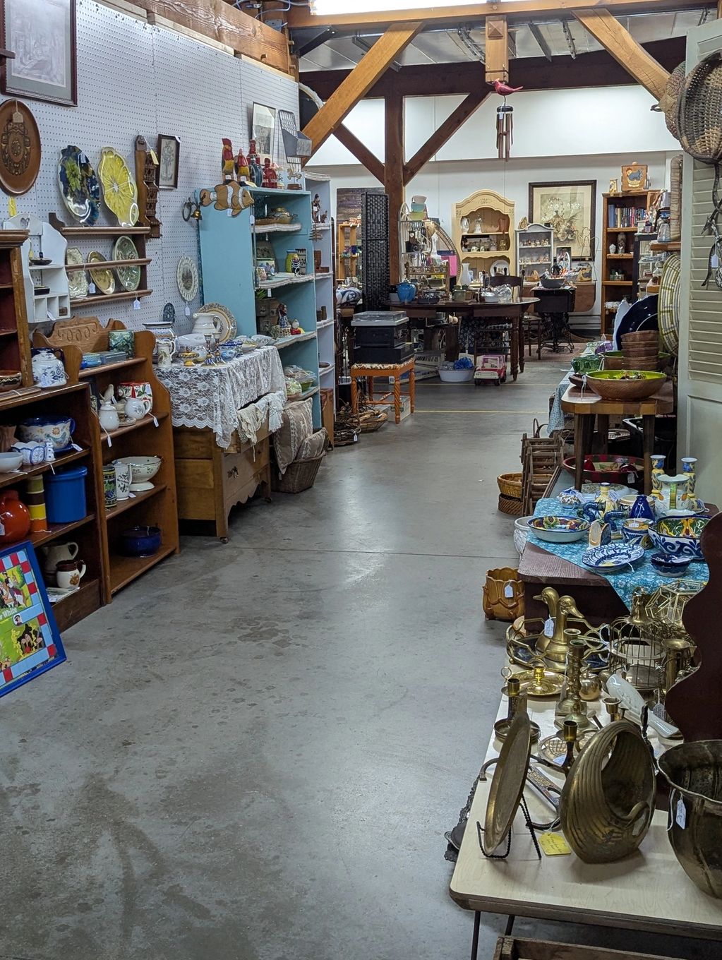 Brass collectibles, pottery, wicker baskets, sports collectibles, wood carving and more
