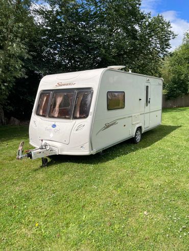 An example of a touring caravan we have purchased for cash