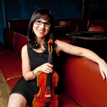 Master Fiddler April Verch plays a Rickenbacker Strad Copy violin. Click link to hear April play. 