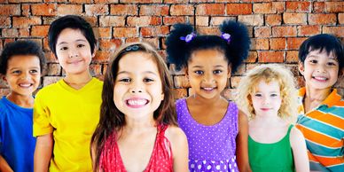 diverse group of smiling children