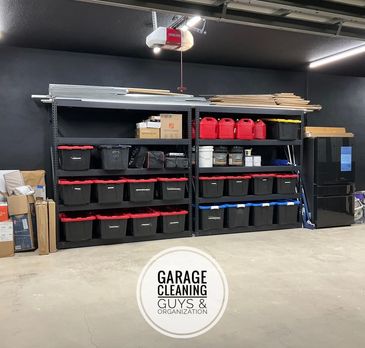 A organized garage with shelving and bins