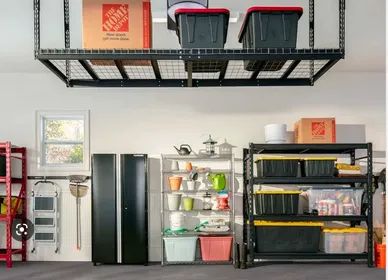 A organized garage with cabinets and garage shelving