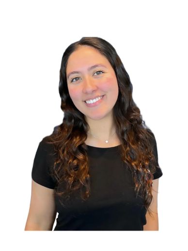 Smiling woman with long curly hair in a black shirt against a white background.