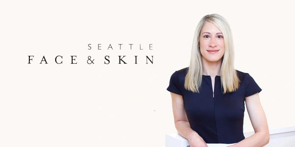 Professional woman with long blonde hair posing beside "Seattle Face &amp; Skin" text.