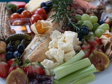 Cheese platter with assorted cheeses and accompaniments