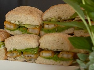 fish finger sandwich with mushy minted peas and flakey cod fish fingers