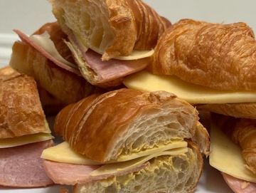 flakey croissant with ham and gouda cheese, English mustard 