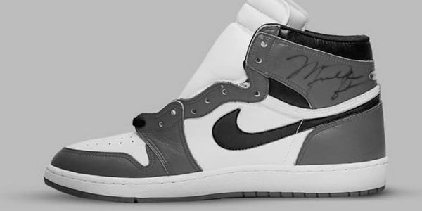 Black and white Nike Air Jordan sneaker.
