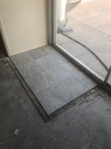 Tile at backyard entry needs to be removed.