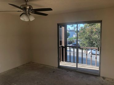 Upstairs master bedroom needs carpet and blinds.