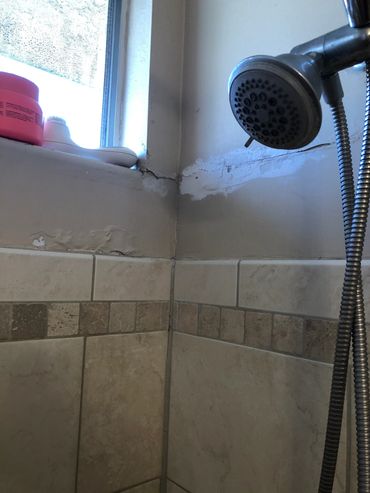 Tile in bathroom looks good but the drywall does not.