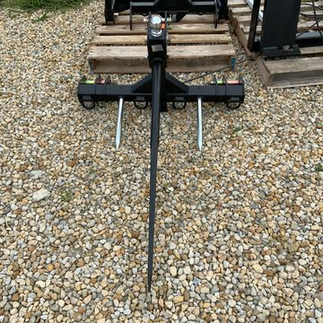 Trailer mover with bale spikes