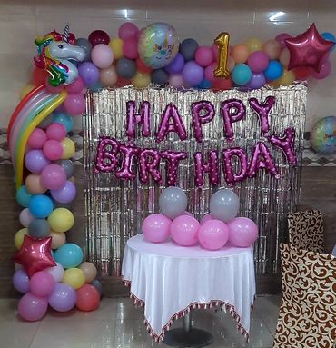 Unicorn foil balloon arch decoration setup at home by Bhardwaj Balloons. 🦄🎈
