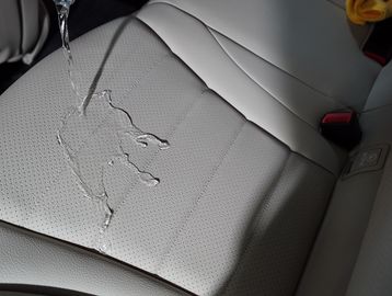 Fabric ceramic coating to protect the vehicle's interior from stains, spills, and damage.