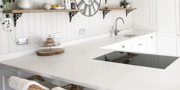 White quartz worktops with a very subtle marble pattern. Bianco Merino bright kitchen worktop 