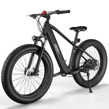Black fat-tire electric mountain bike with sturdy frame and front suspension.