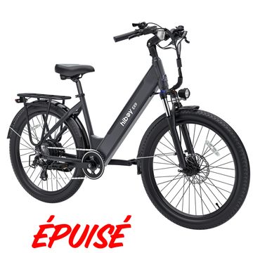 Black electric bicycle with fat tires and rear rack.
