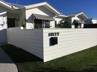 140mm wide Select grade Pine slat fencing and gate, capped and Painted.