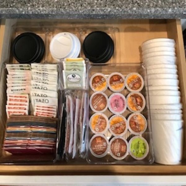 Efficiently organized coffee and tea drawer.
