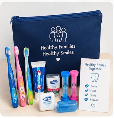 Dental care kit with toothbrushes and toothpaste.