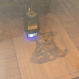 Bamboo cutting board with flannel shirt cow.