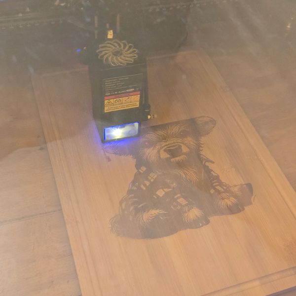 Bamboo cutting board with flannel shirt cow.