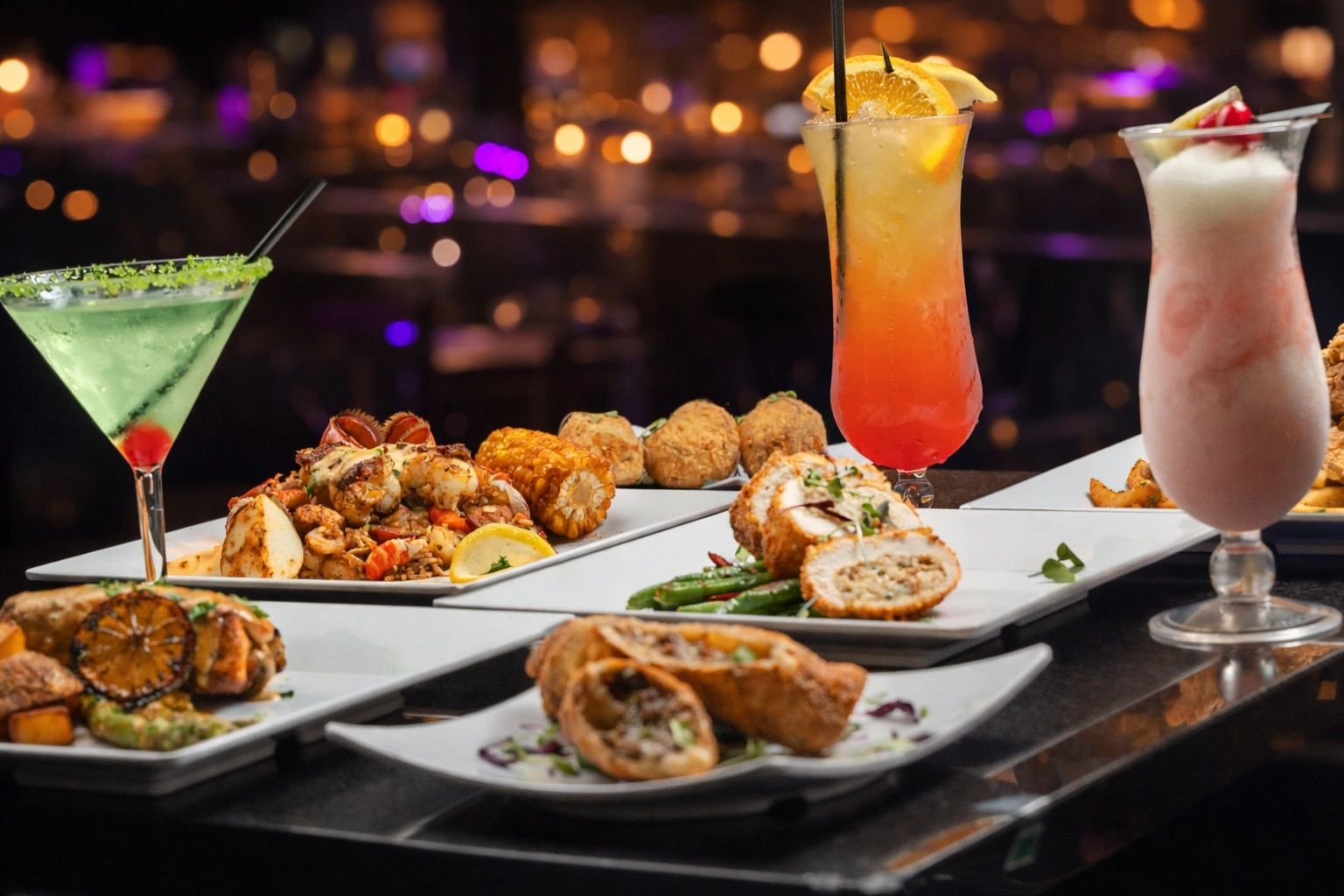 A variety of gourmet dishes and colorful cocktails on white plates in a dimly lit setting.