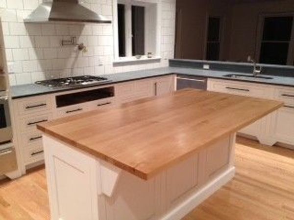 New kitchen design with solid wood countertop