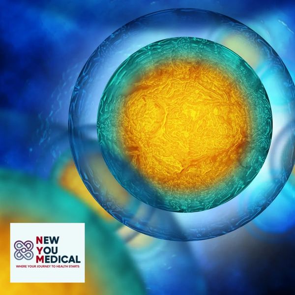 Close-up of a vibrant biological cell with a glowing nucleus.