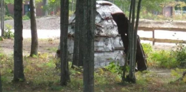 Wigwam outside through trees